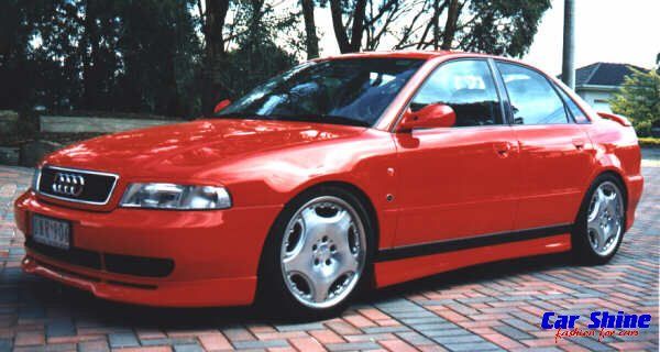 AudiA4FrontRedSedanZenderView.jpg.5e1790badcf9f8bd0e1379b9cf835875.jpg