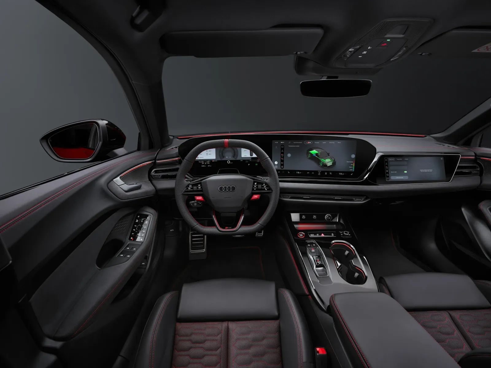 Wnętrze Audi RS 5 2026 z panoramicznym wyświetlaczem MMI i sportową kierownicą..webp
